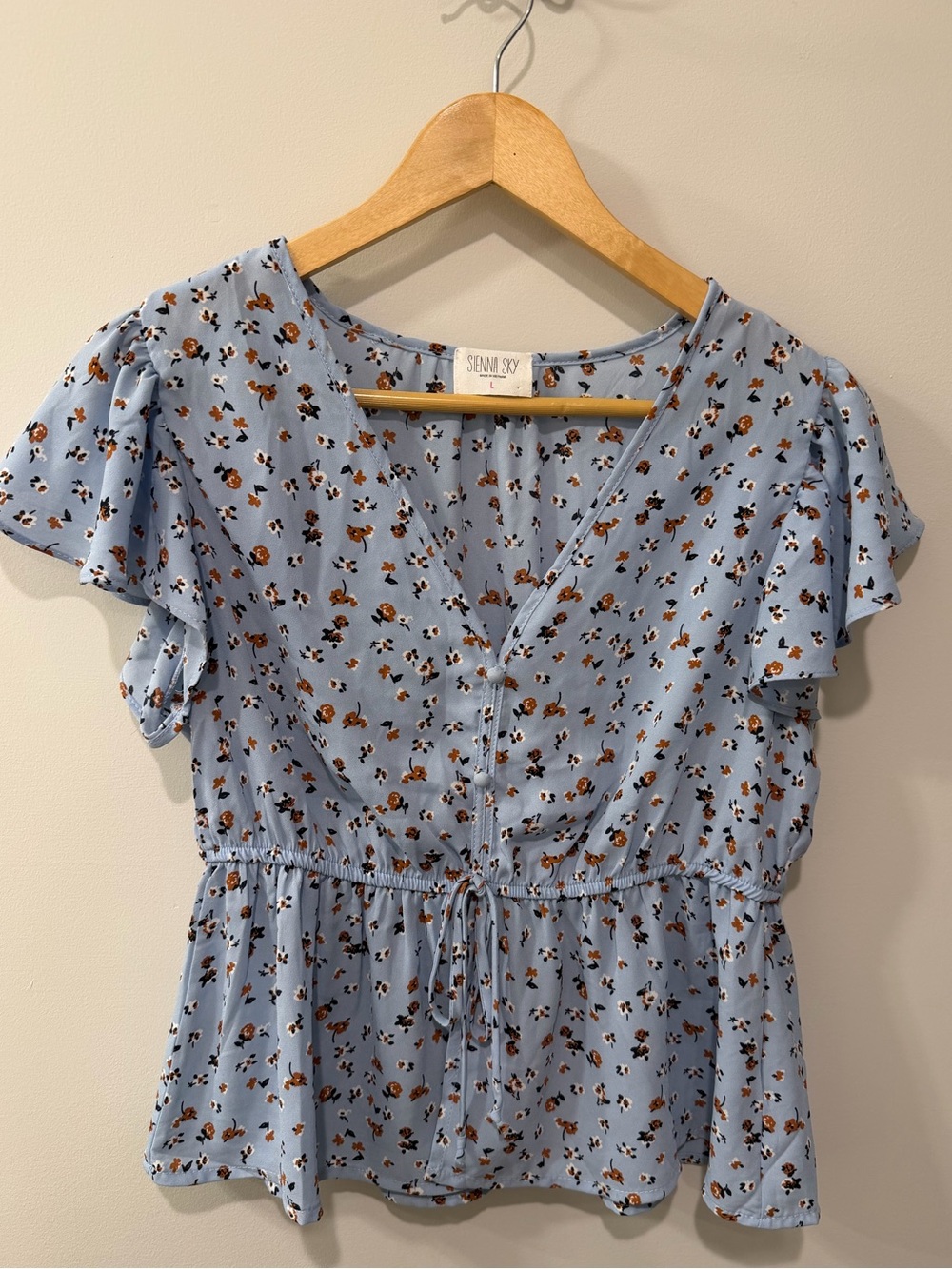 Sienna Sky Light Blue Floral Tie-Waist Blouse